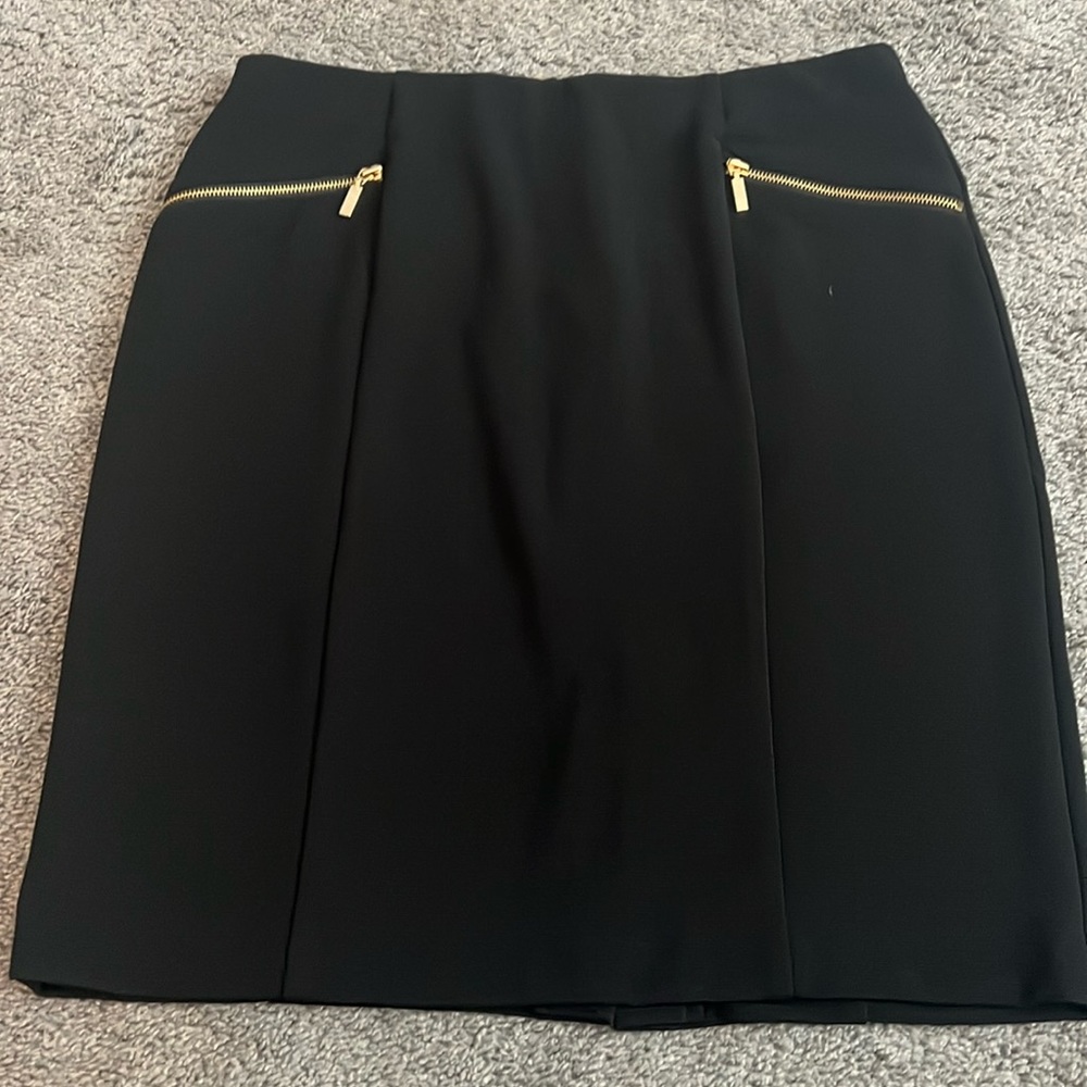 Black pencil skirt with gold zipper detail